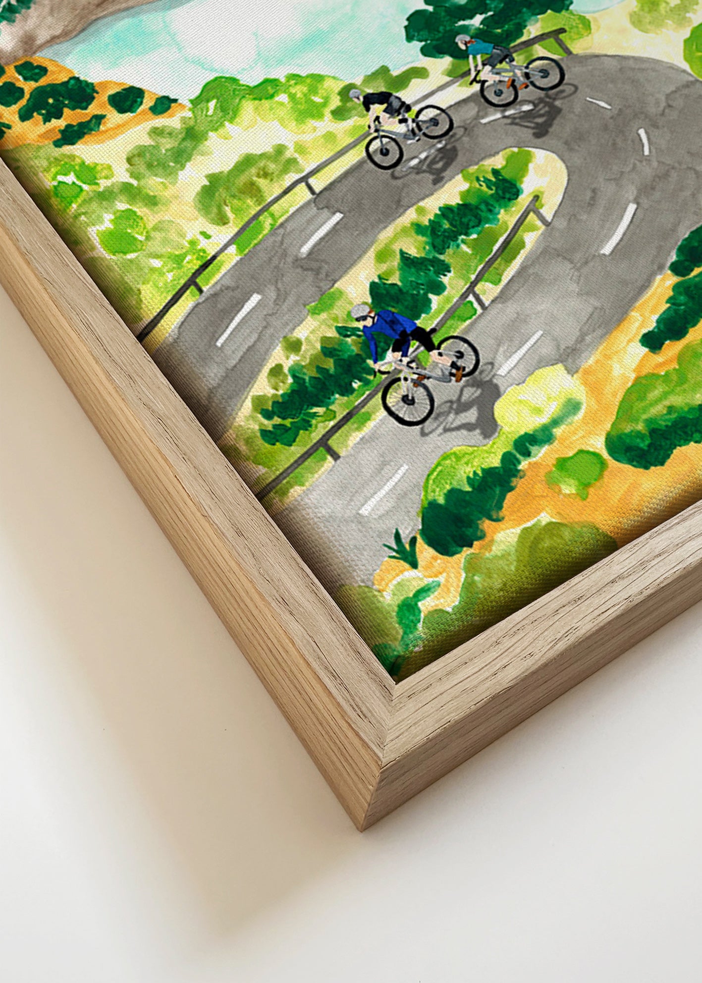 Cuadro deportivo con ciclistas en ruta costera – Canvas detail