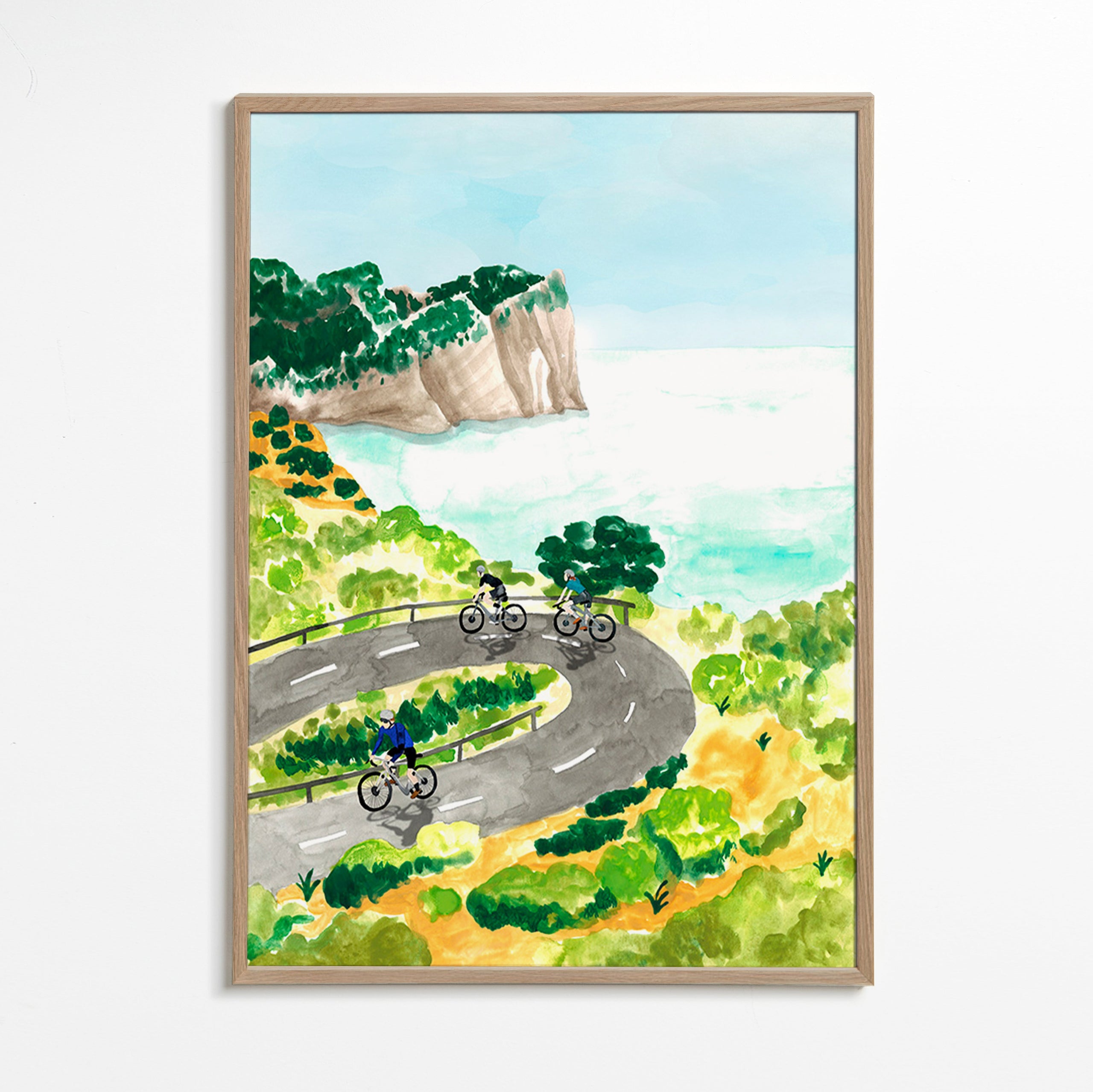 Cuadro deportivo con ciclistas en ruta costera – Oak Frame