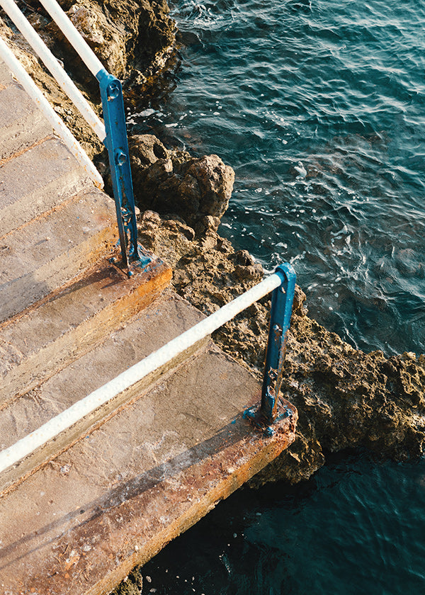 Cuadro de paisaje con escalera al mar