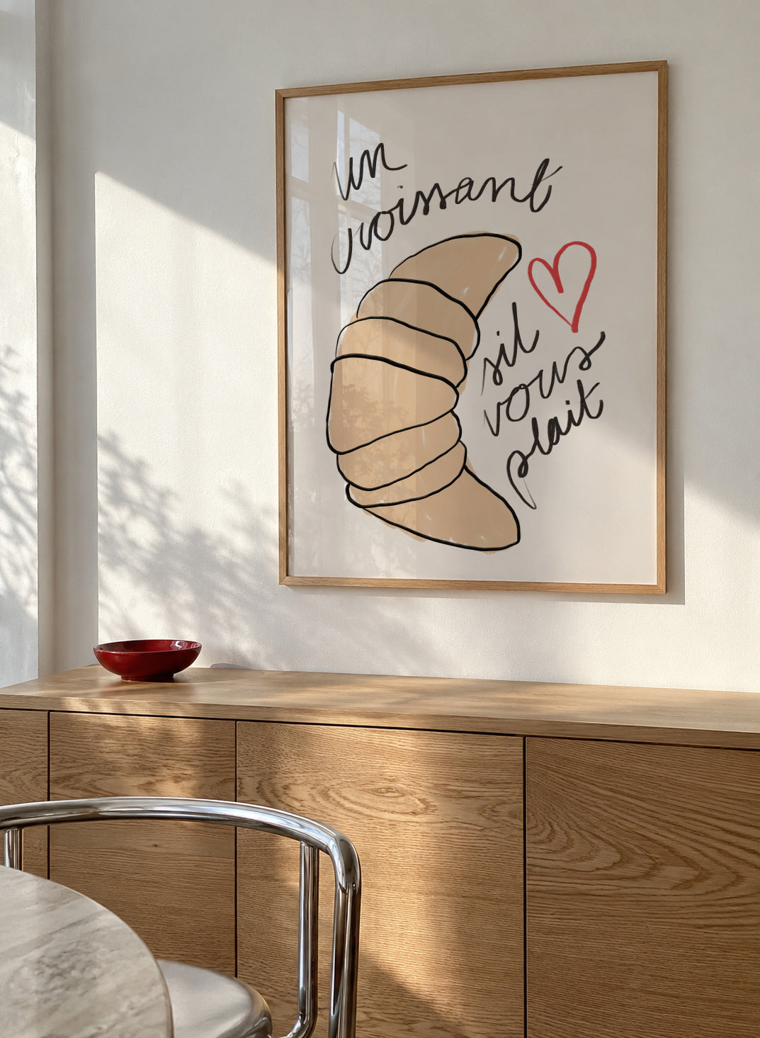 Un Croissant - Framed poster in an interior