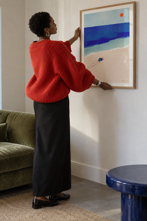 Following the sun - Framed poster in an interior
