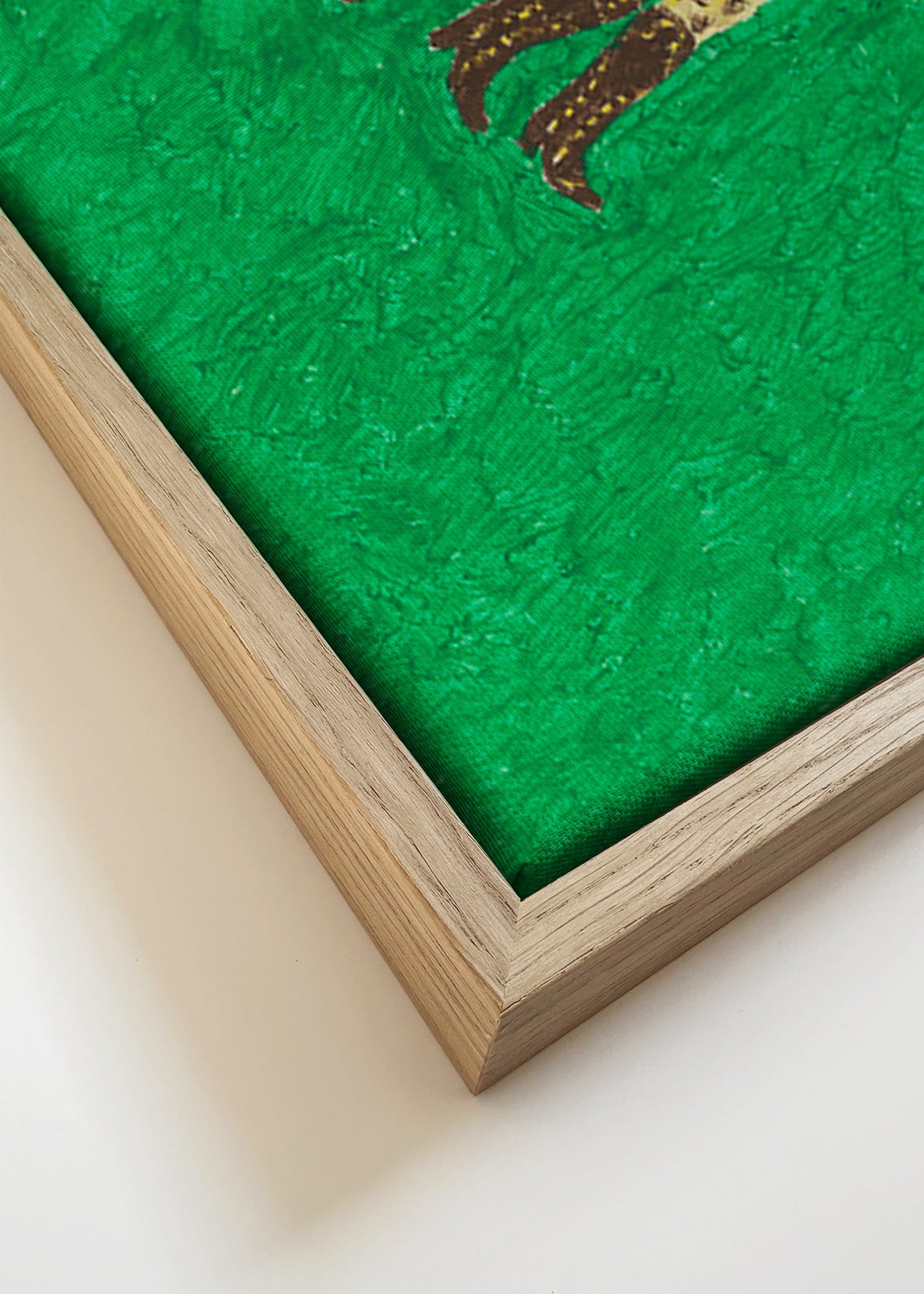 Cuadro guepardo en carrera sobre fondo verde – Canvas detail