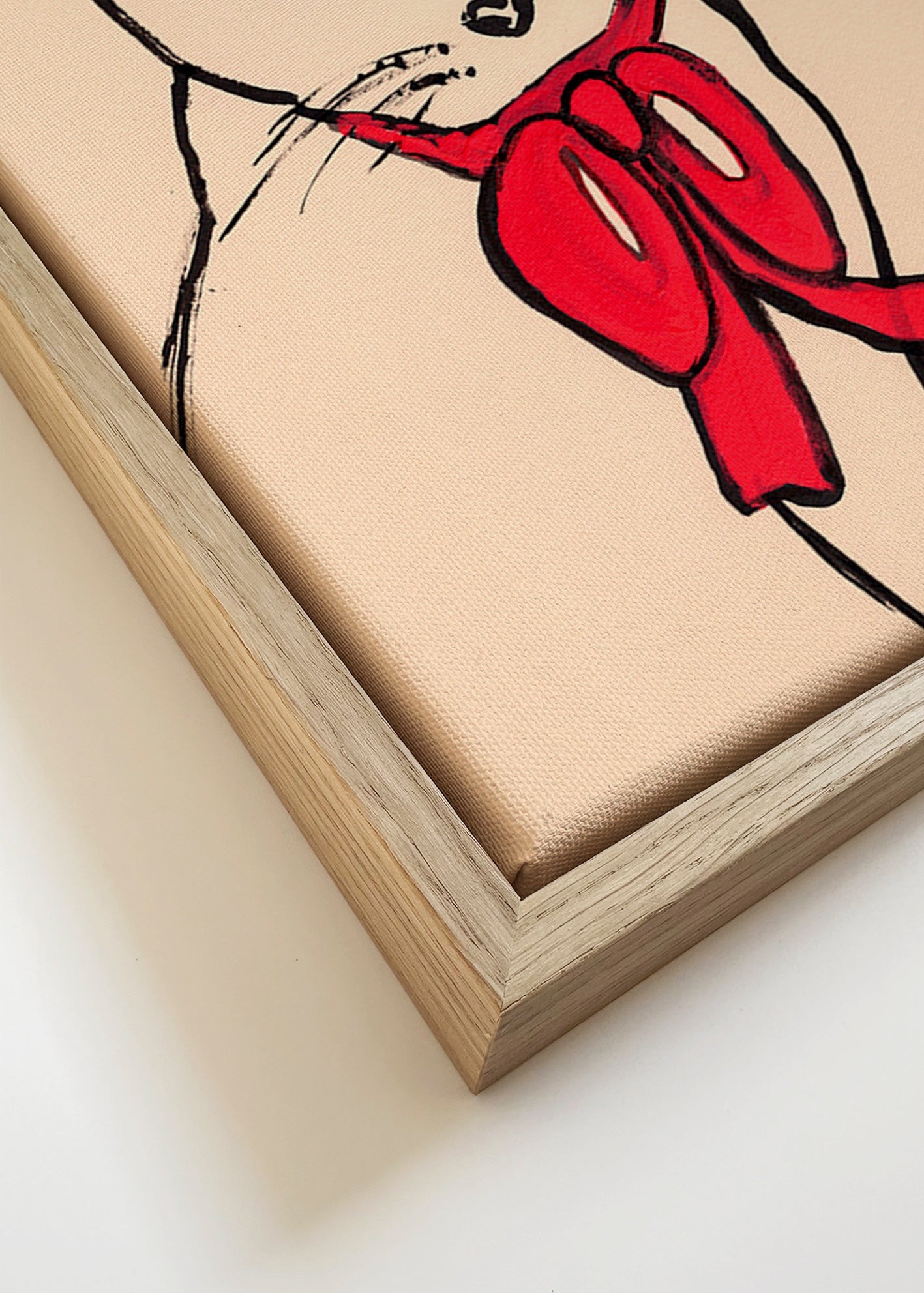 Cuadro gato con lazo rojo y trazo suelto – Canvas detail