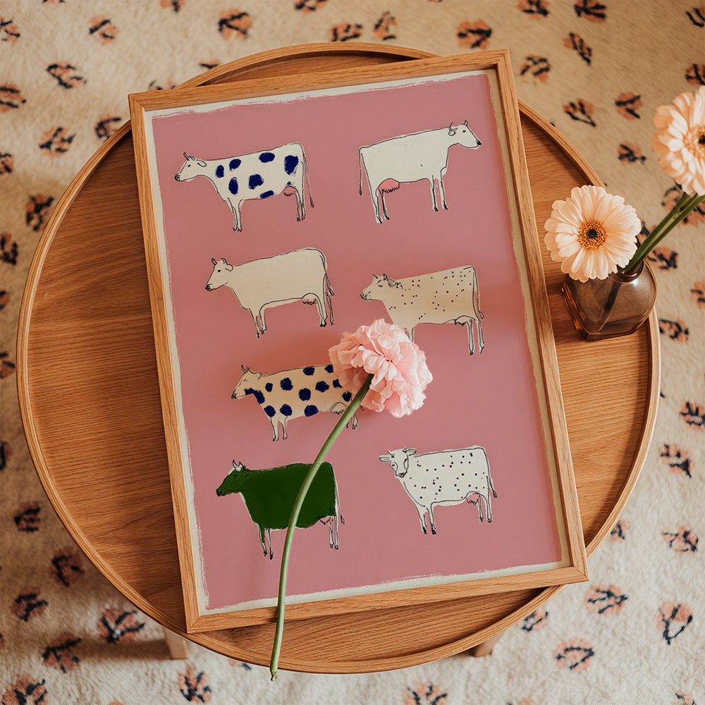 Cuadro de vacas ilustradas sobre fondo rosa – Product1