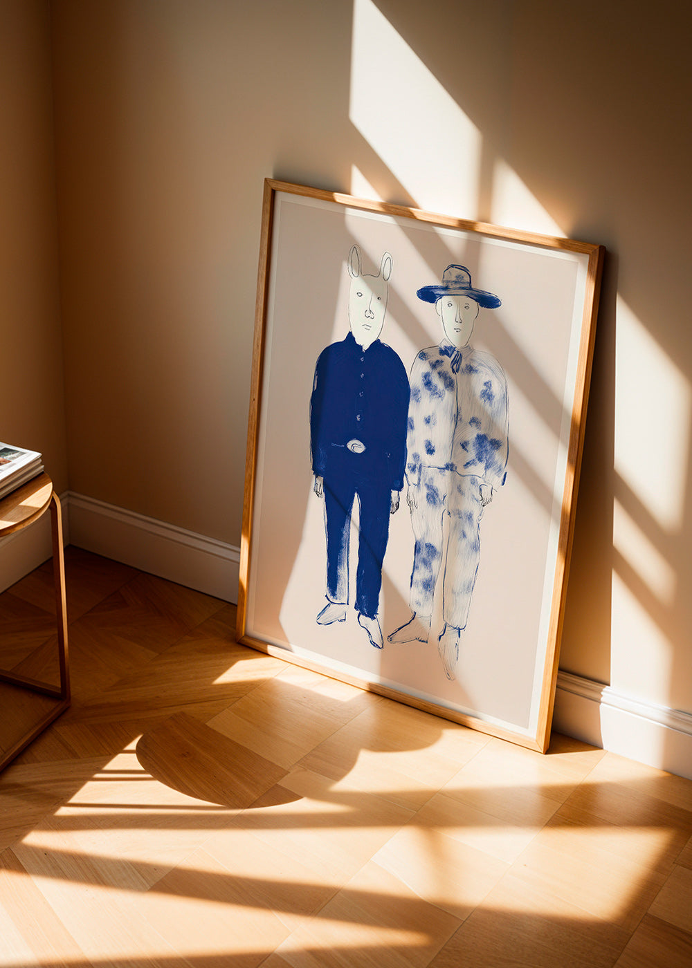 Ilustración de dos figuras con conejito en tinta azul – Product1
