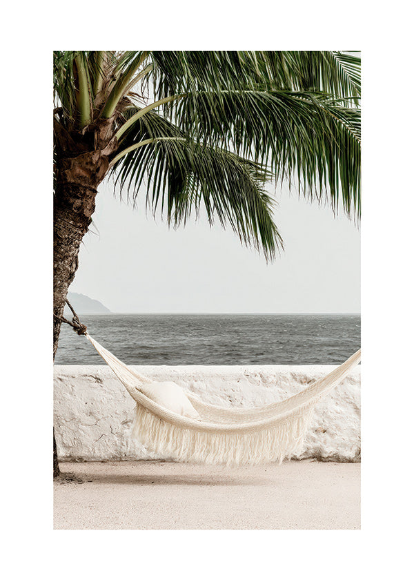 Cuadro de paisaje con hamaca y palmera